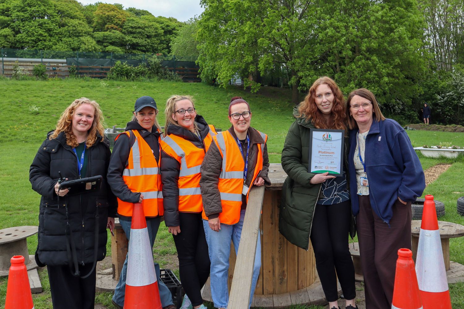 Members of the Hady Primary School Play Team and the school's OPAL Leads celebrating with Platinum Quality Mark certificate
